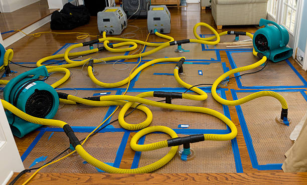Professional Flood Damage Restoration technician working in Landenberg, PA
